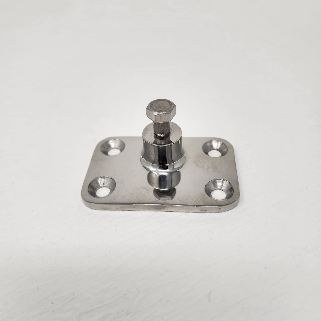 Metallic hinge with a bolt on a white background
